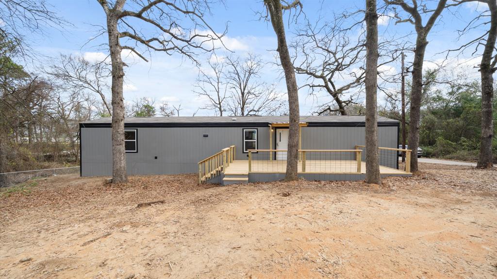 721 Queens Drive Tool, TX 75143 - Photo 2 of 30 a view of street with a tree