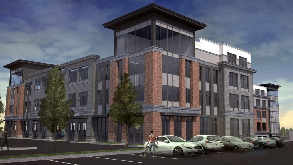 918 Providence Highway, Unit 314 Dedham, MA 02026 - Photo 10 of 10 a front view of a building with lot of cars and trees