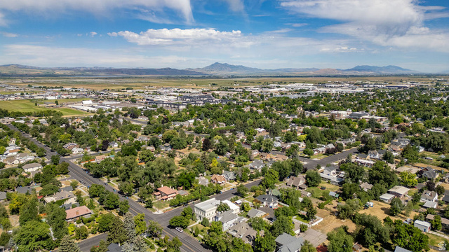 299 West Center Street, Unit 2 Logan, UT 84321 - Photo 45 of 46 Expansive aerial perspective showcasing a residential neighborhood with mature tree coverage