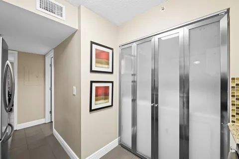 a view of elevator with hallway