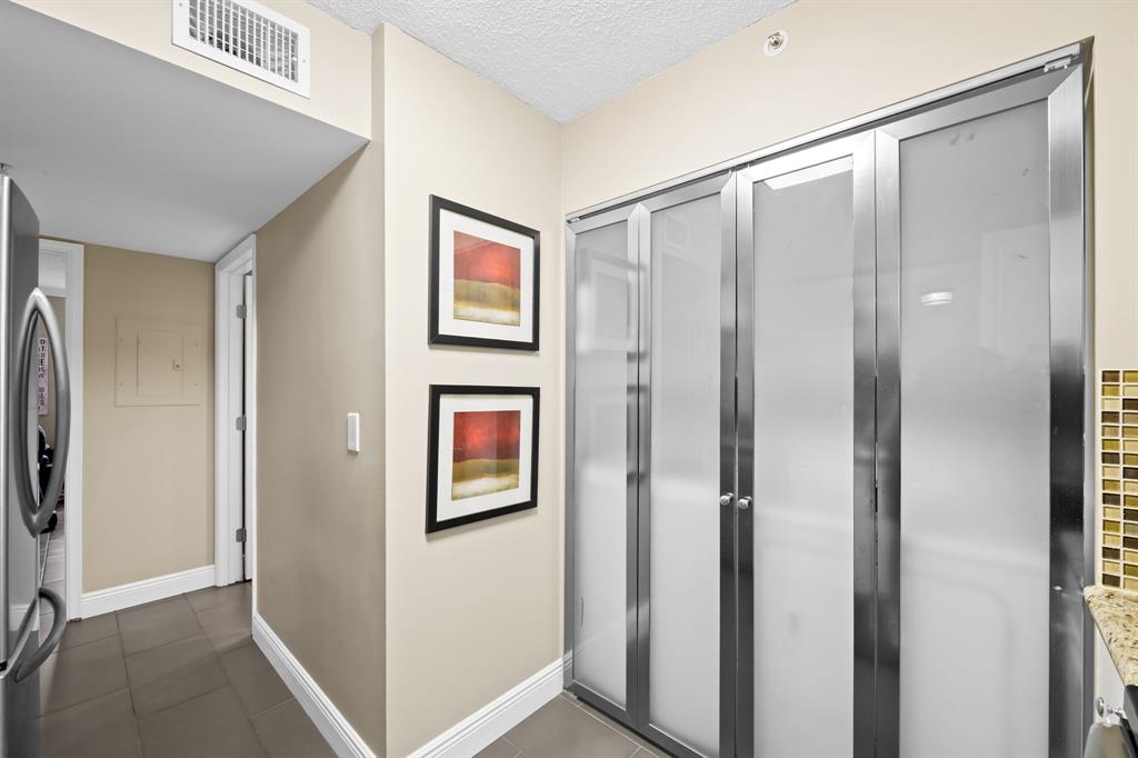 1341 Southeast 3rd Avenue, Unit 206 Dania Beach, FL 33004 - Photo 9 of 20 a view of elevator with hallway