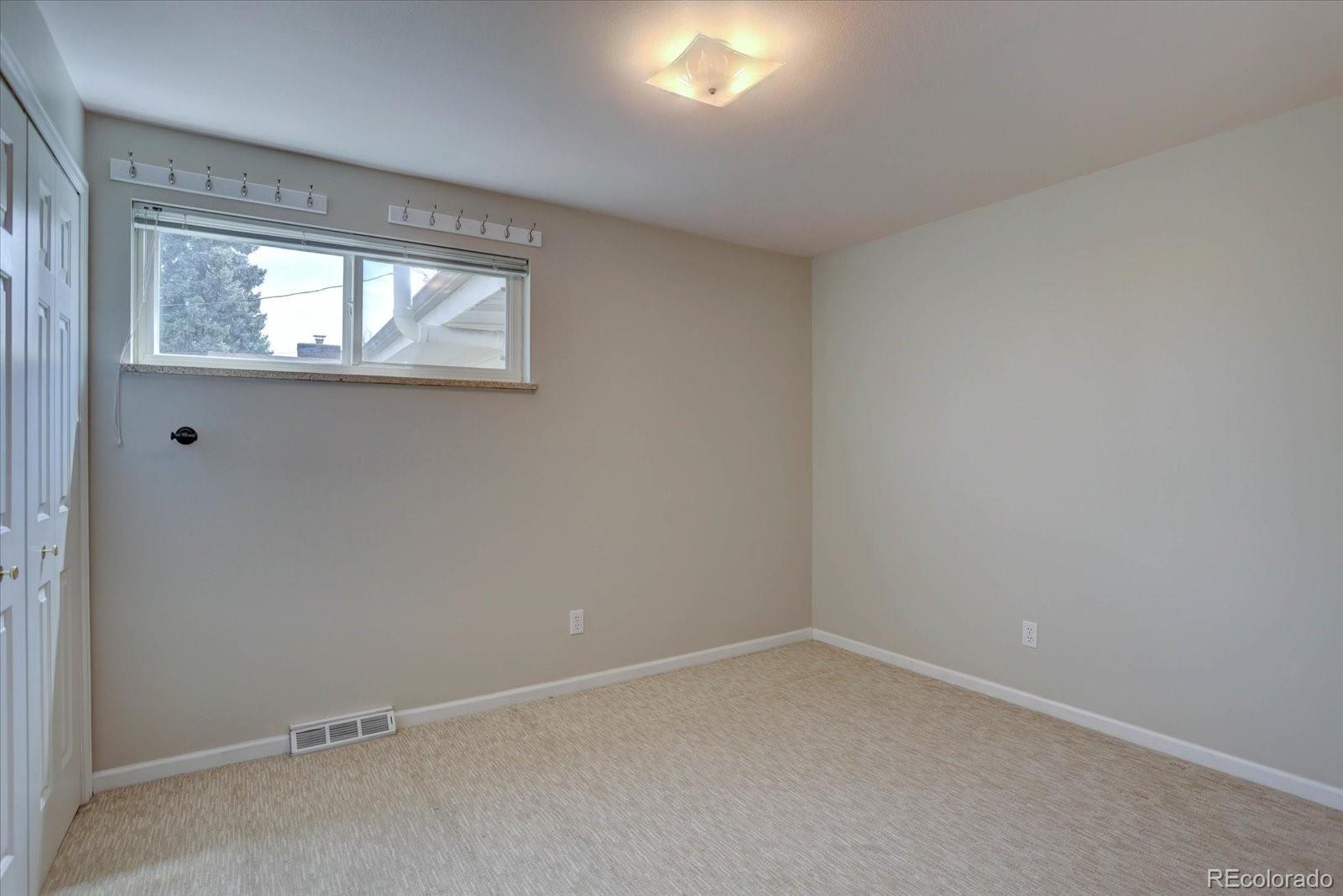 6272 South Garfield Drive Centennial, CO 80121 - Photo 23 of 37 an empty room with a window