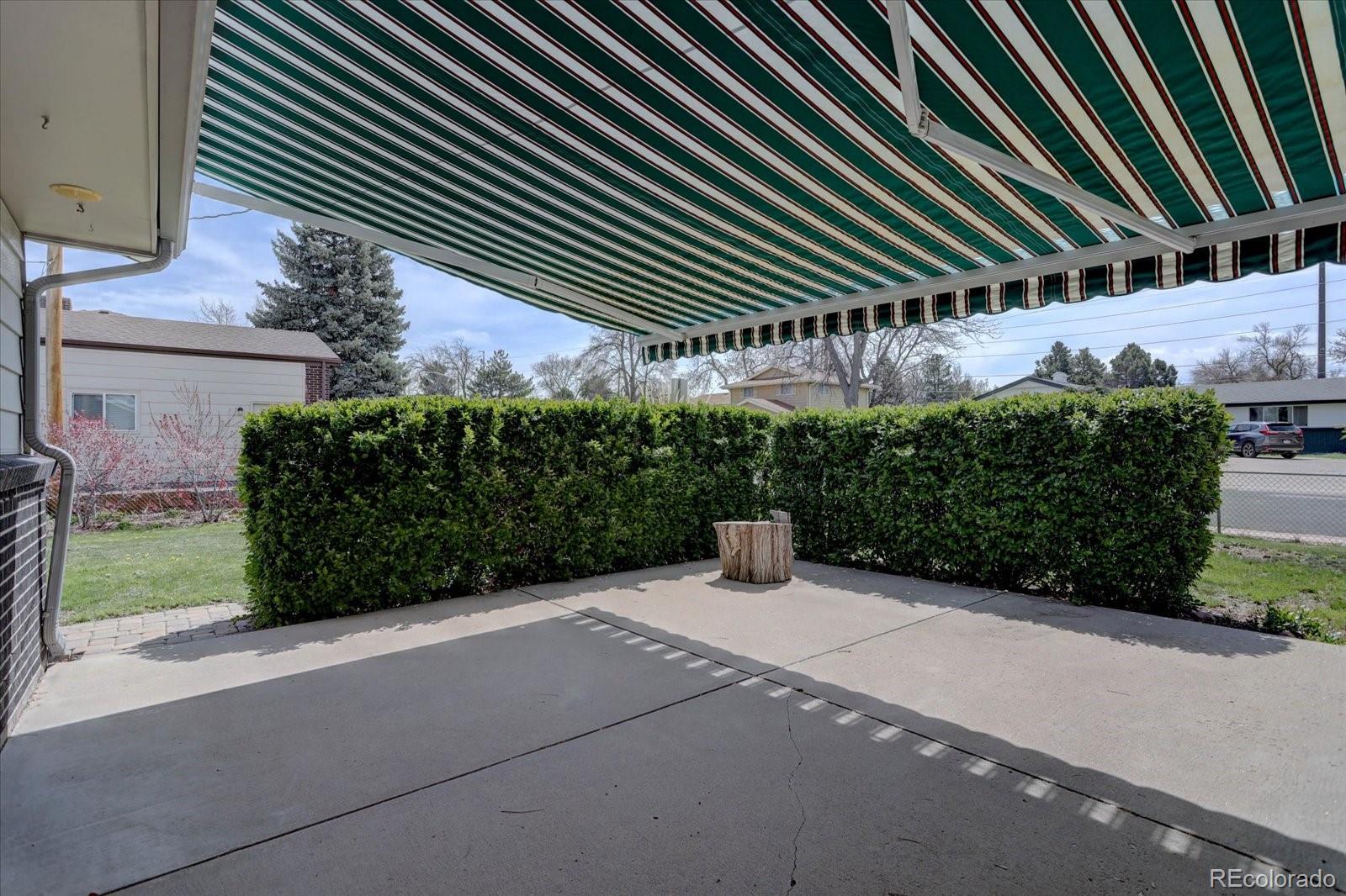 6272 South Garfield Drive Centennial, CO 80121 - Photo 34 of 37 a view of a backyard with plants
