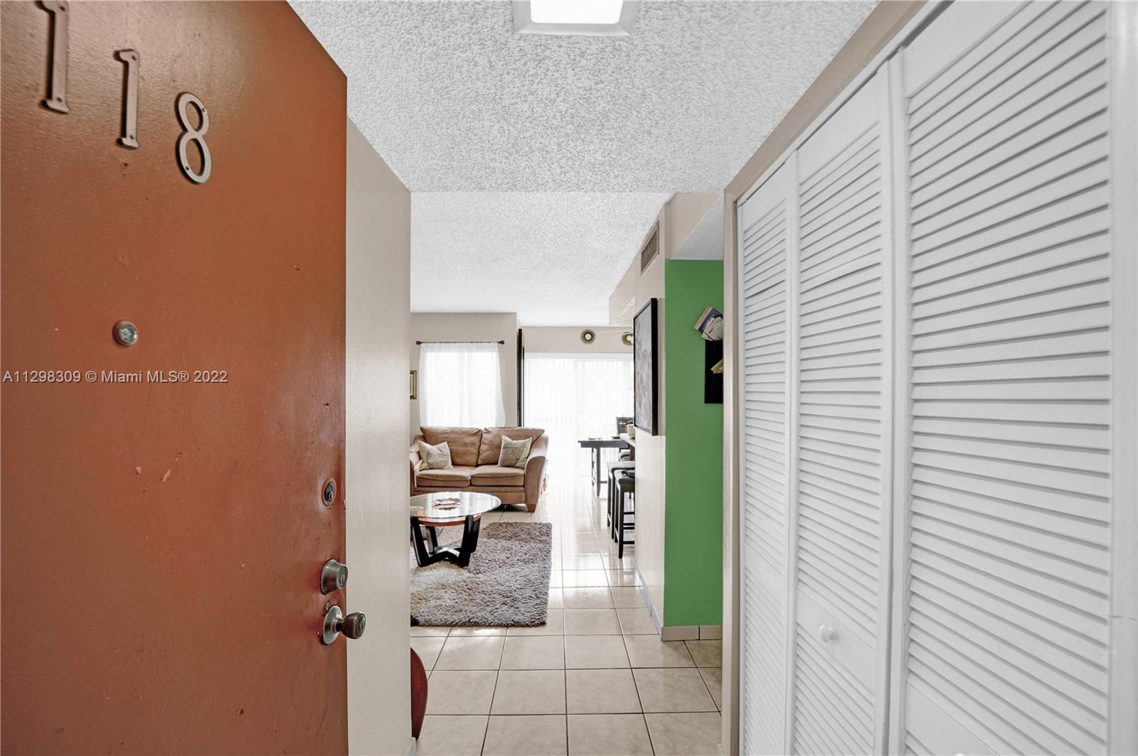 9331 Southwest 4th Street, Unit 118B Miami, FL 33174 - Photo 3 of 16 a view of living room with furniture