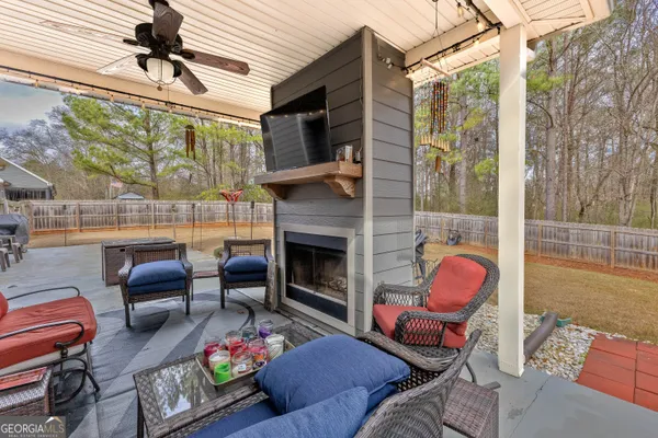 a backyard of a house with seating space