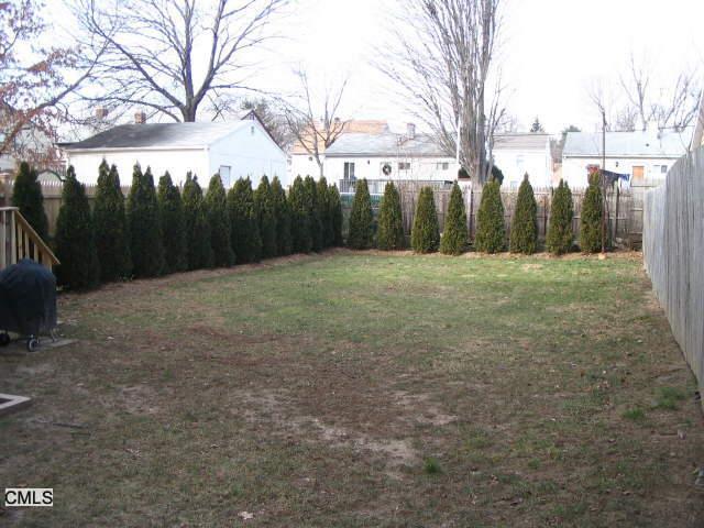 86 Rakoczy Avenue Fairfield, CT 06824 - Photo 1 of 1 a view of an outdoor space and a yard