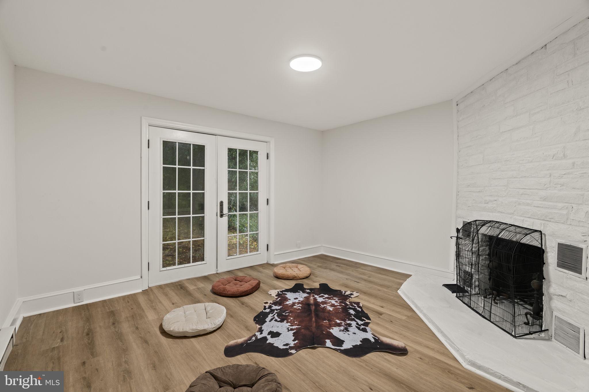 147 Harvey Street Philadelphia, PA 19144 - Photo 12 of 37 a view of a livingroom with furniture and a fireplace