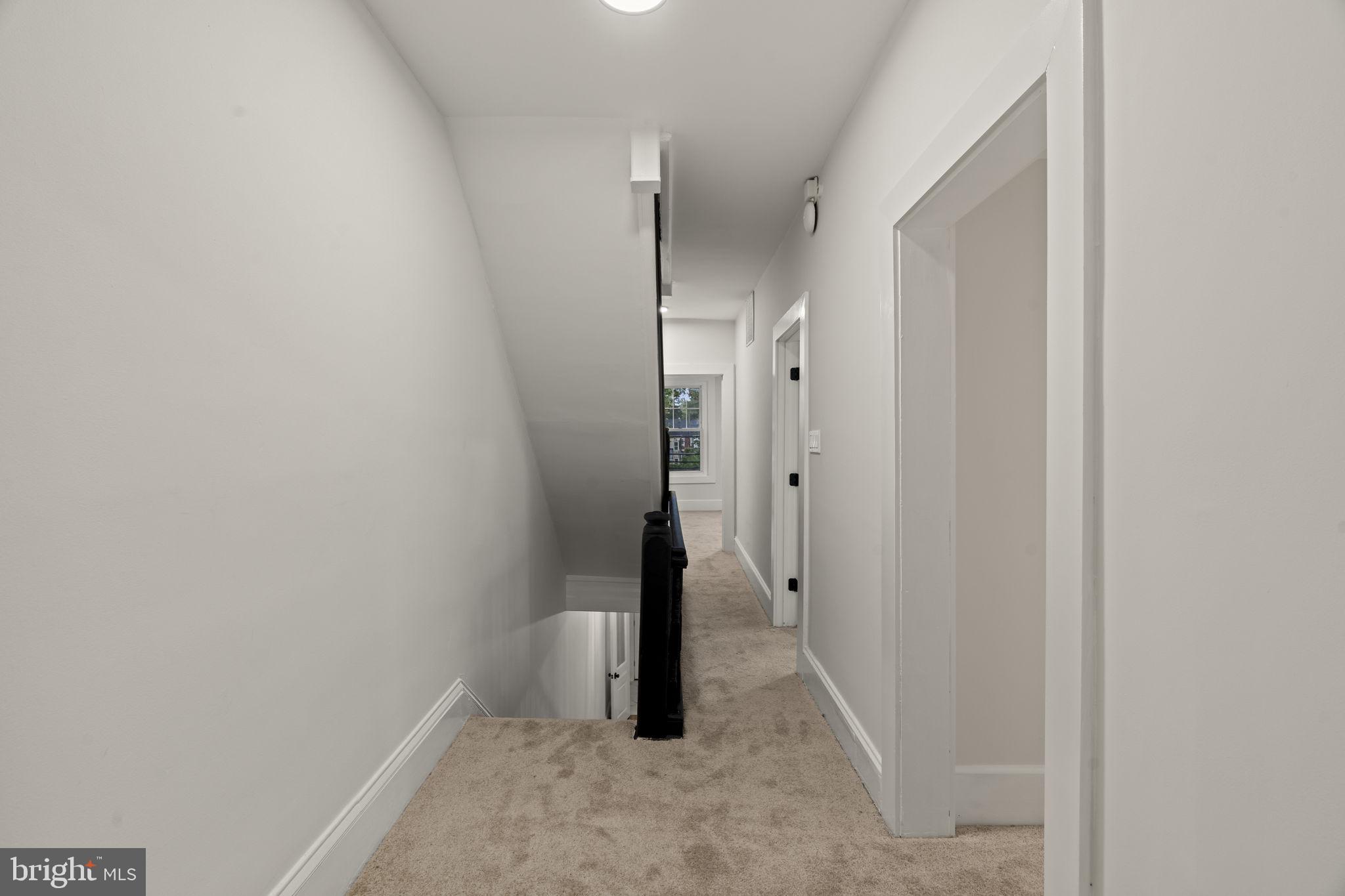 147 Harvey Street Philadelphia, PA 19144 - Photo 26 of 37 a view of a hallway with hallway and stairs