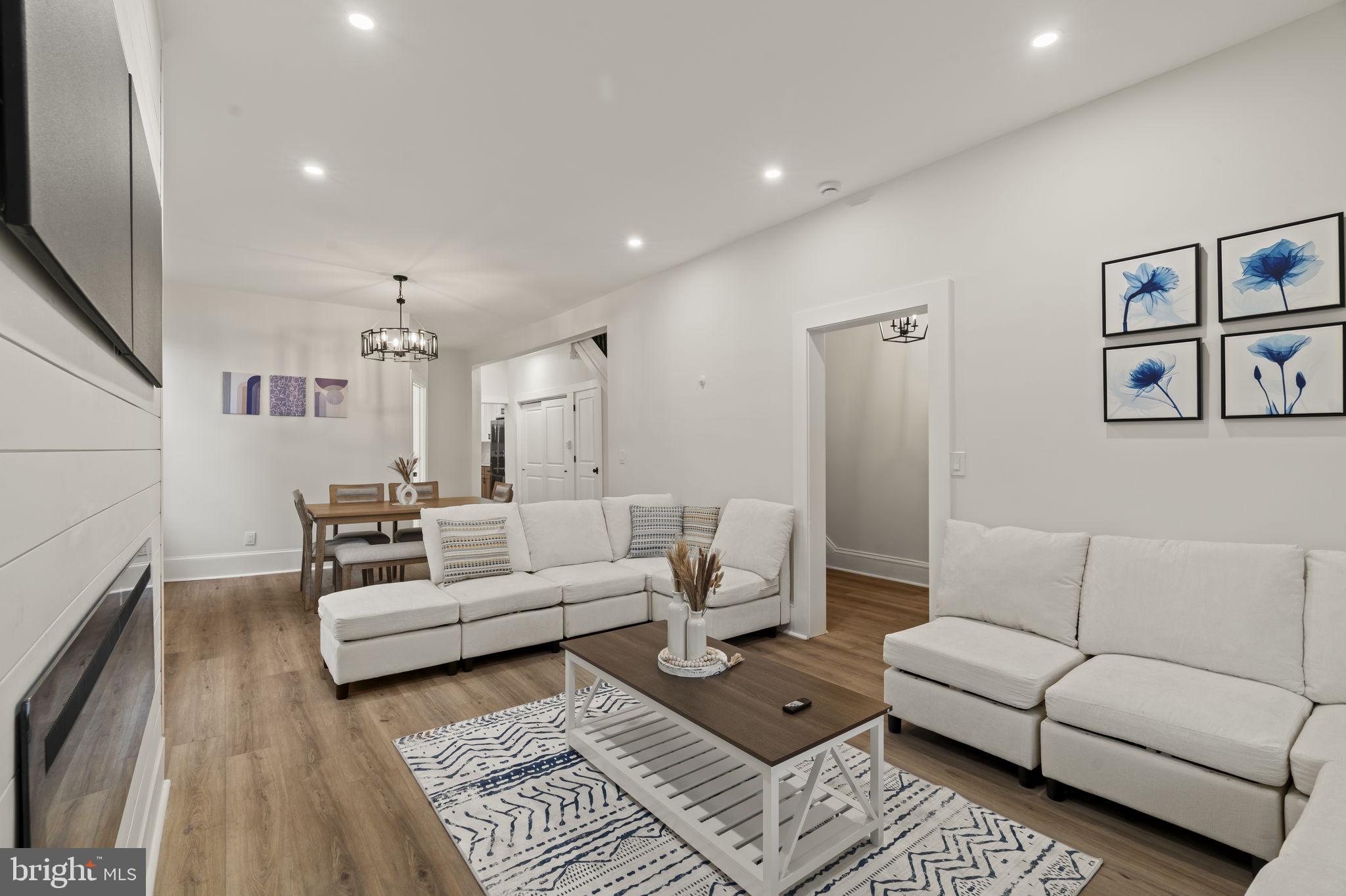 147 Harvey Street Philadelphia, PA 19144 - Photo 7 of 37 a living room with furniture and a couch