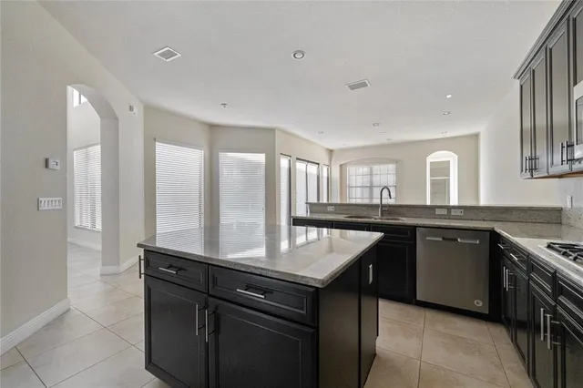 a view of a kitchen with a sink