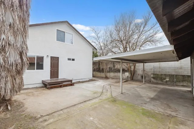 a view of a backyard of a house
