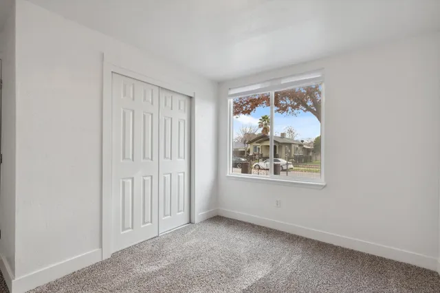 an empty room with windows