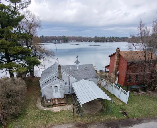 $214,900 | 151 South Turk Lake Drive, Greenville, MI 48838