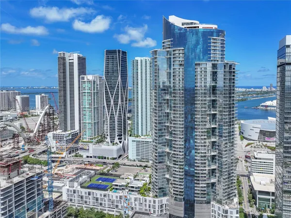 a view of a city with tall buildings