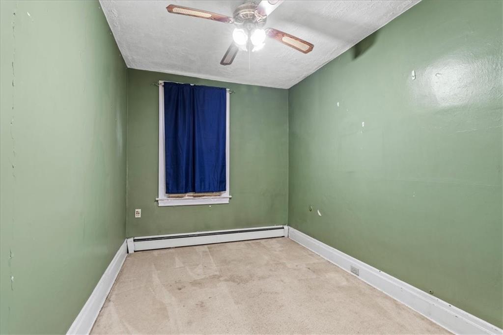 503 Marie Avenue Pittsburgh, PA 15202 - Photo 16 of 31 a view of empty room with chandelier fan