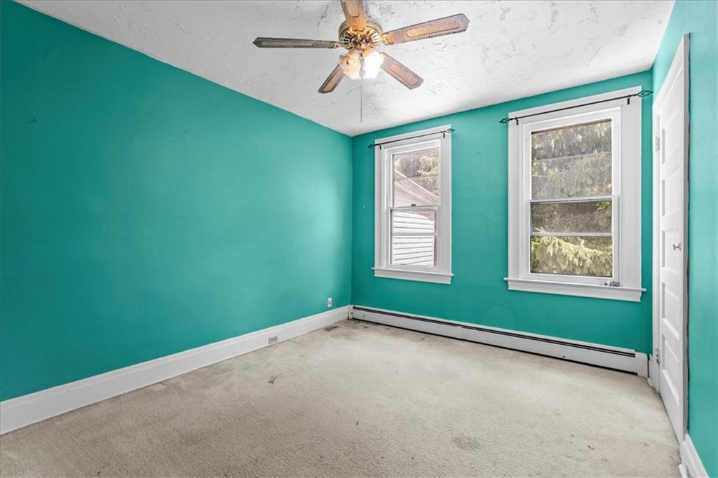 503 Marie Avenue Pittsburgh, PA 15202 - Photo 17 of 31 a view of a room with window and a ceiling fan