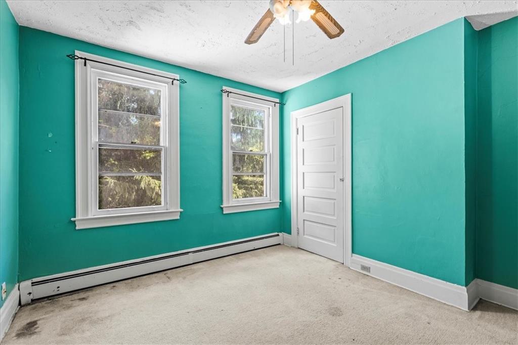 503 Marie Avenue Pittsburgh, PA 15202 - Photo 18 of 31 a view of room with window and ceiling fan
