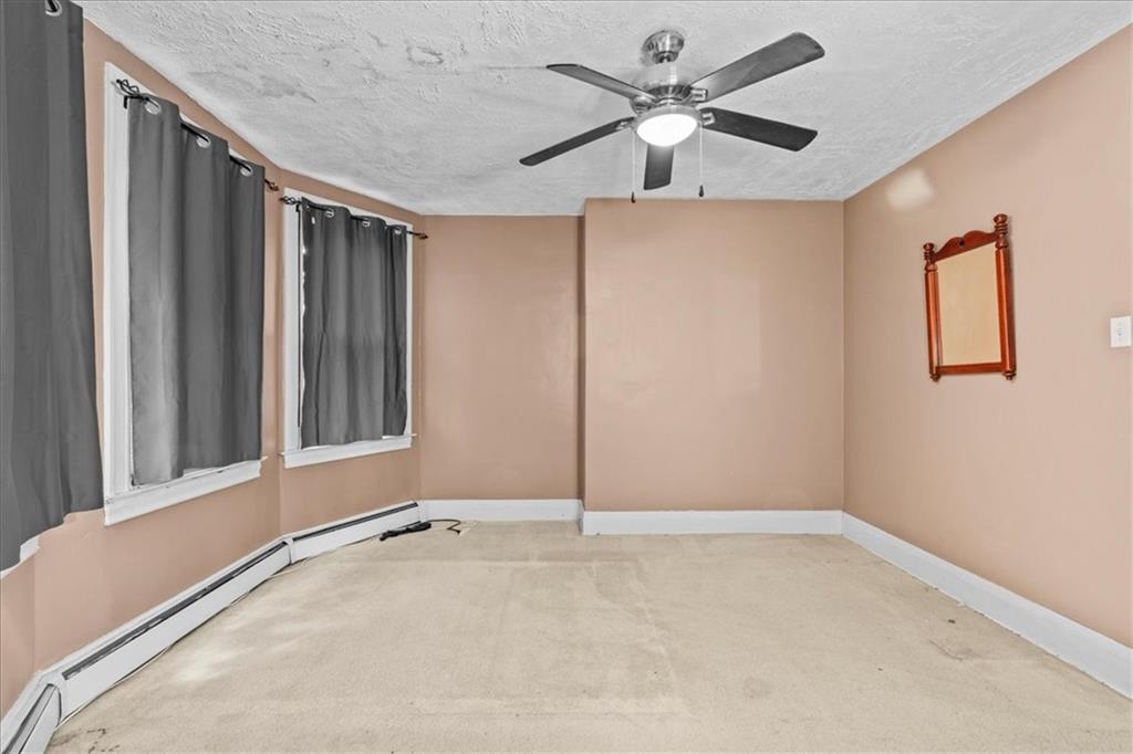 503 Marie Avenue Pittsburgh, PA 15202 - Photo 20 of 31 an empty room with windows and fan