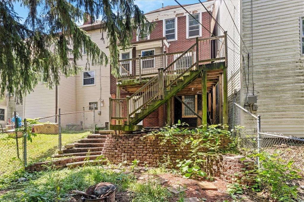 503 Marie Avenue Pittsburgh, PA 15202 - Photo 30 of 31 a view of a building with a small yard