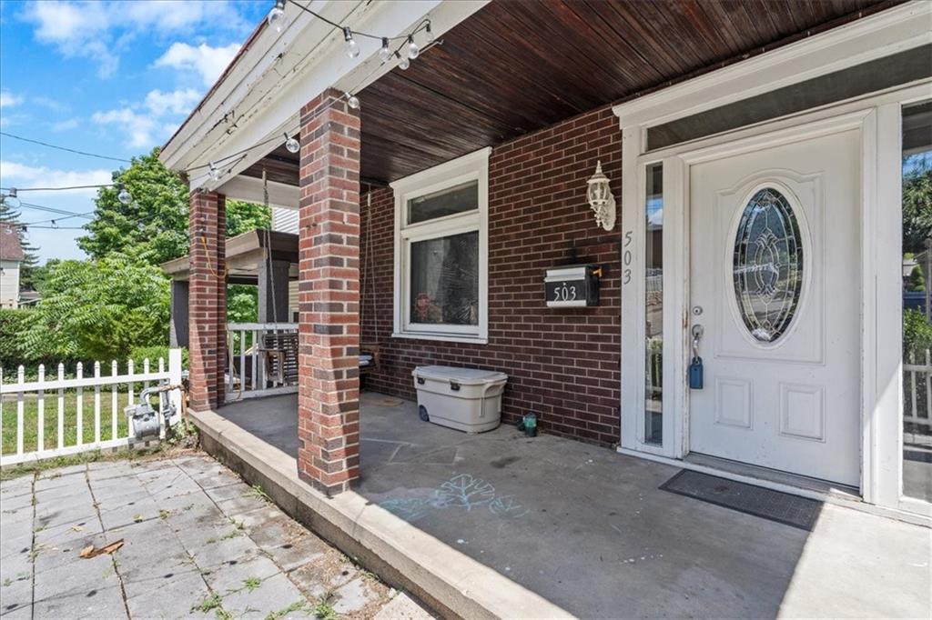 503 Marie Avenue Pittsburgh, PA 15202 - Photo 3 of 31 a view of a house with a small backyard