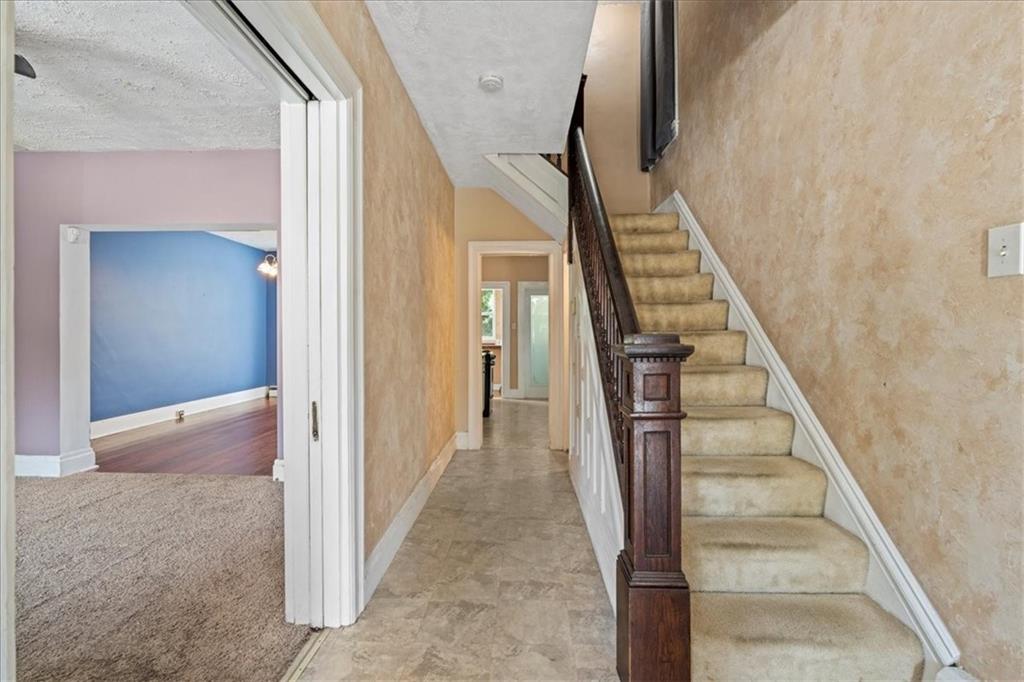 503 Marie Avenue Pittsburgh, PA 15202 - Photo 4 of 31 a view of a hallway with wooden floor and entryway