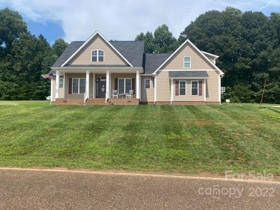 260 Rudisill Road Lincolnton, NC 28092 - Photo 1 of 3 a front view of a house with a yard