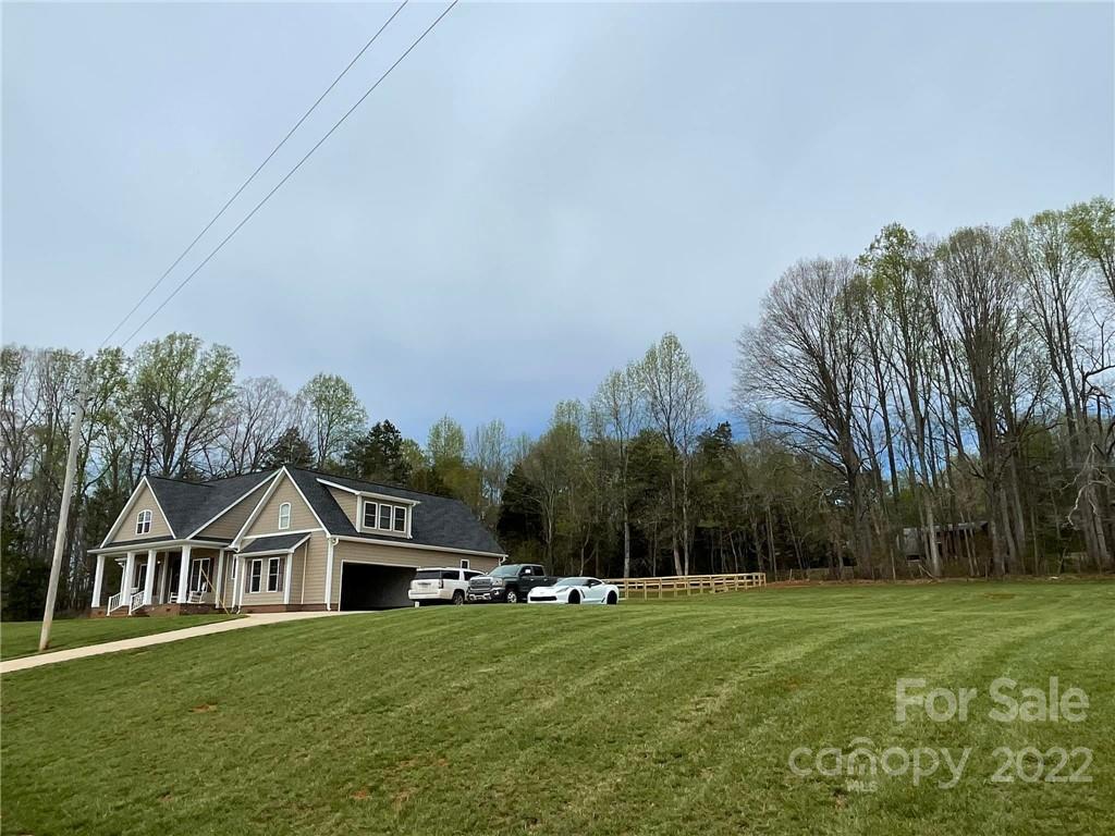 260 Rudisill Road Lincolnton, NC 28092 - Photo 2 of 3 a front view of a house with a yard