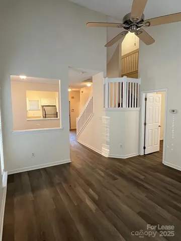 a view of an entryway with wooden floor