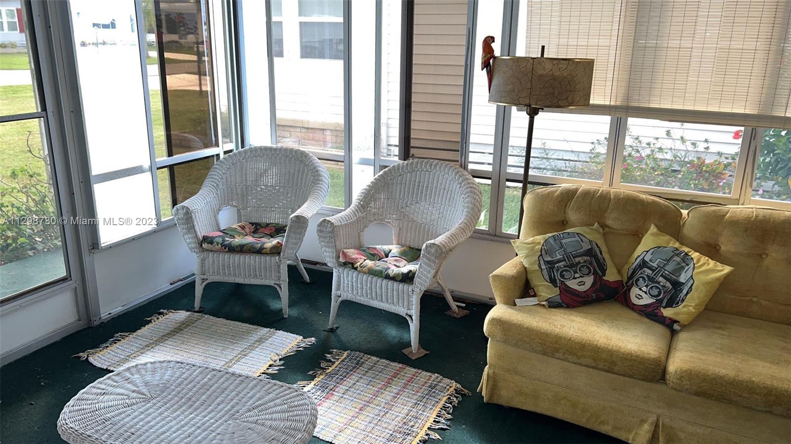3502 Delaware Sebring, FL 33870 - Photo 13 of 21 a living room with furniture and a large window