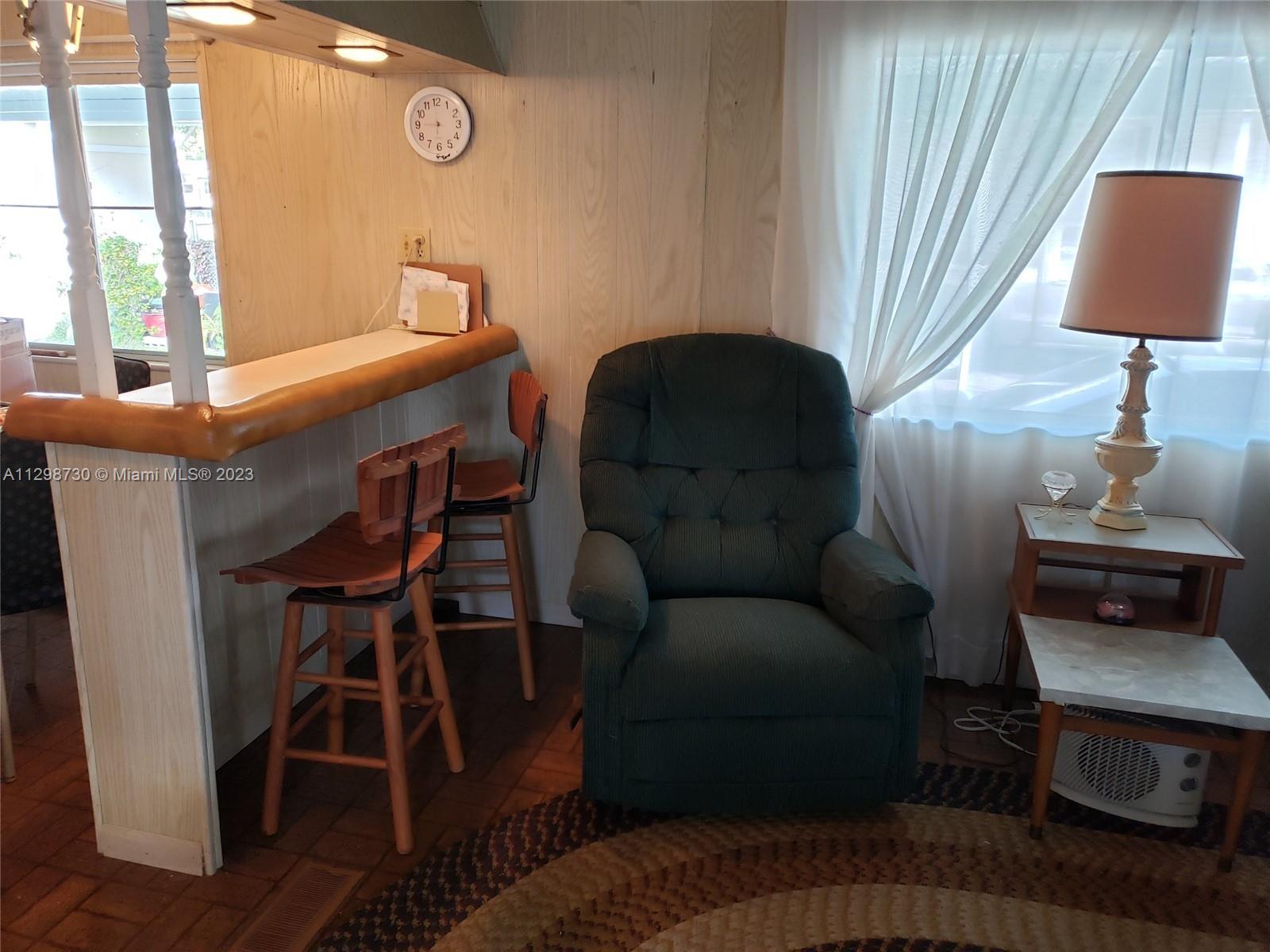 3502 Delaware Sebring, FL 33870 - Photo 6 of 21 a living room with furniture and a window