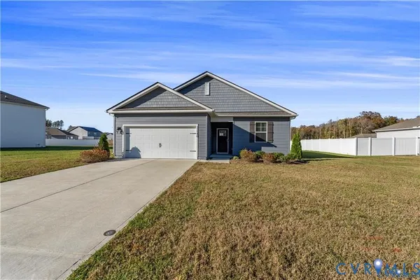a house view with a garden space
