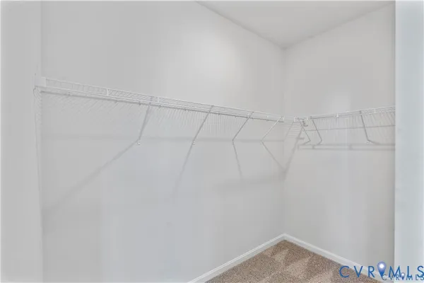 a view of storage and utility room with washer and dryer