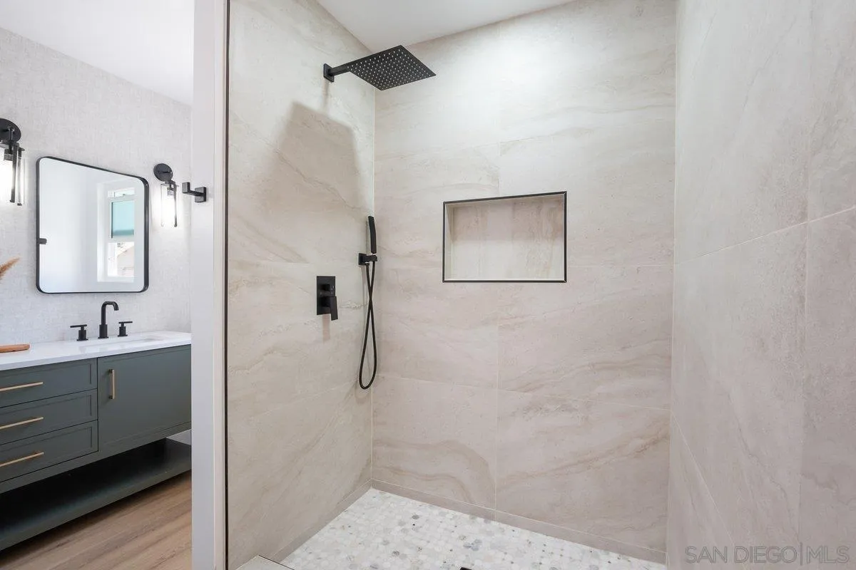 3465 Par Drive La Mesa, CA 91941 - Photo 11 of 16 a bathroom with a sink and a mirror