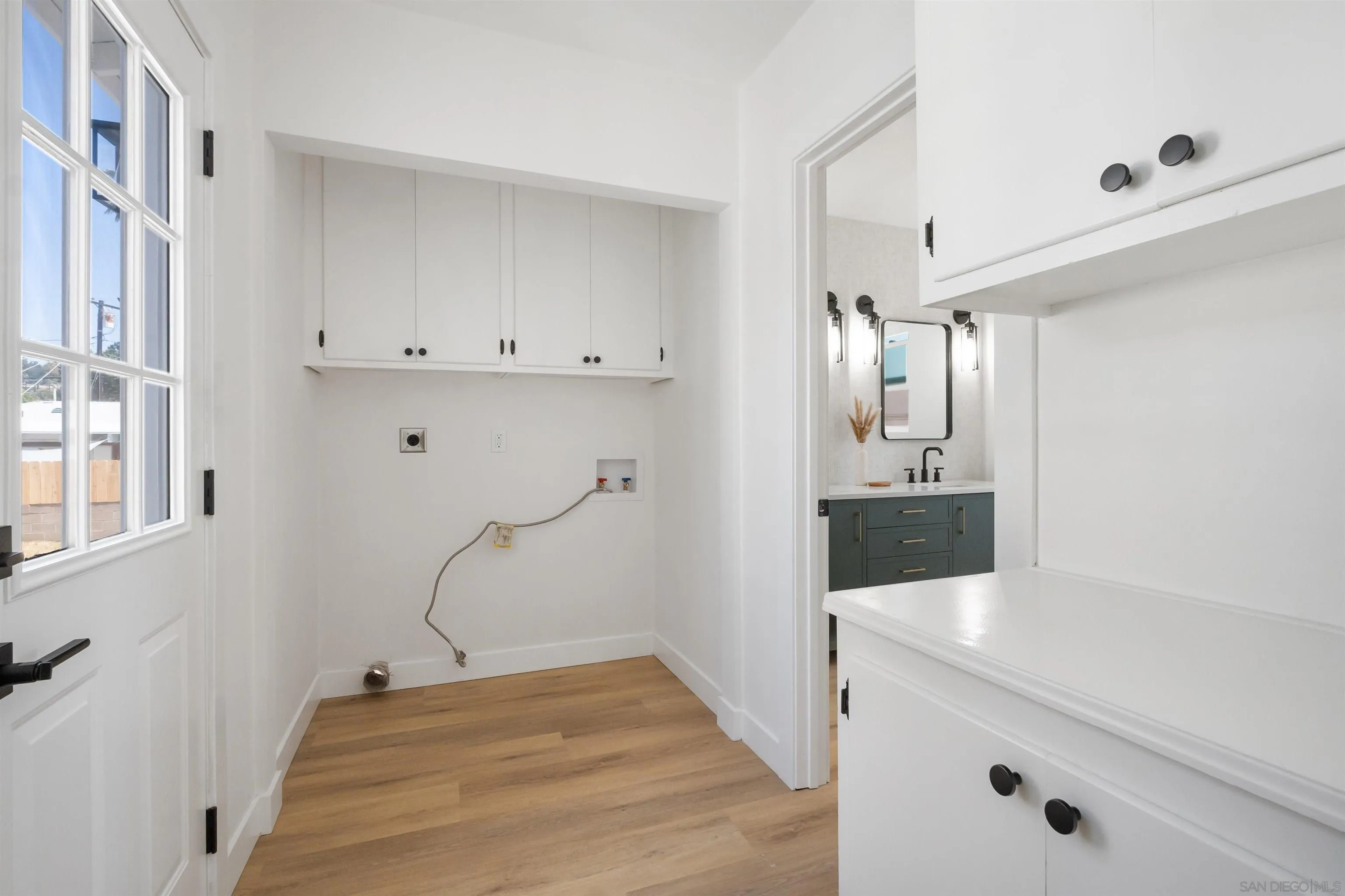 3465 Par Drive La Mesa, CA 91941 - Photo 12 of 16 a bathroom with a sink and mirror