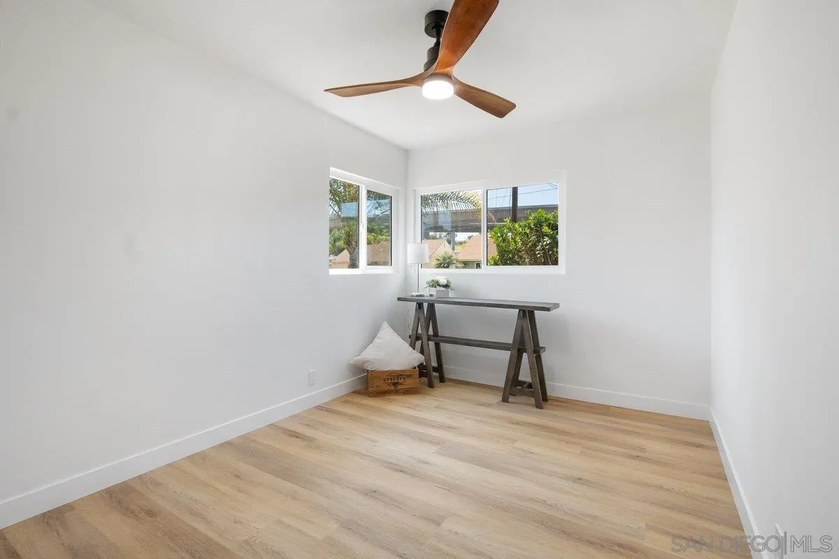 3465 Par Drive La Mesa, CA 91941 - Photo 13 of 16 a view of a room with a wooden floor and a window