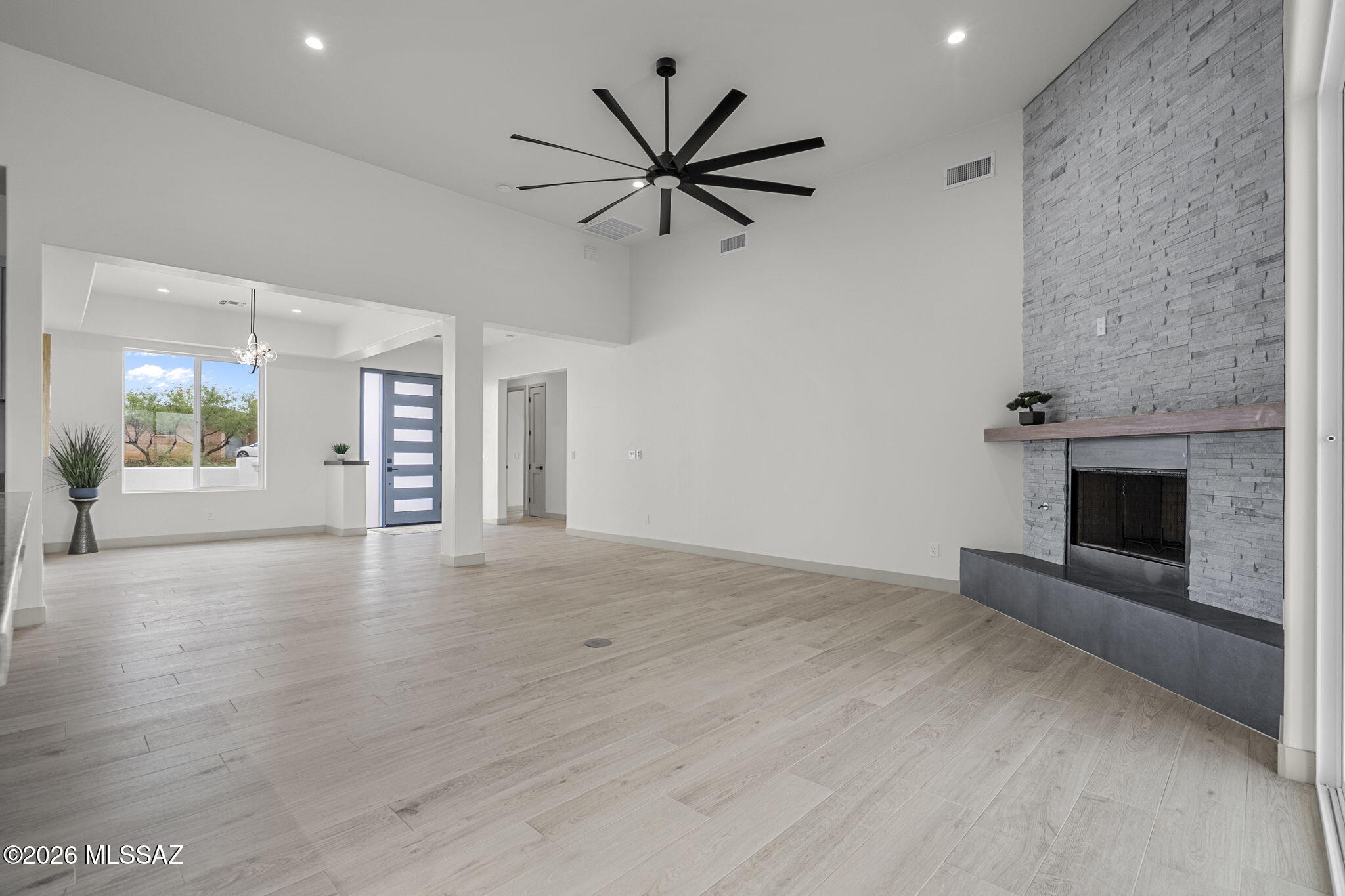 1557 Pinguinos Court Rio Rico, AZ 85648 - Photo 10 of 37 10. Spacious family room with roaring ce