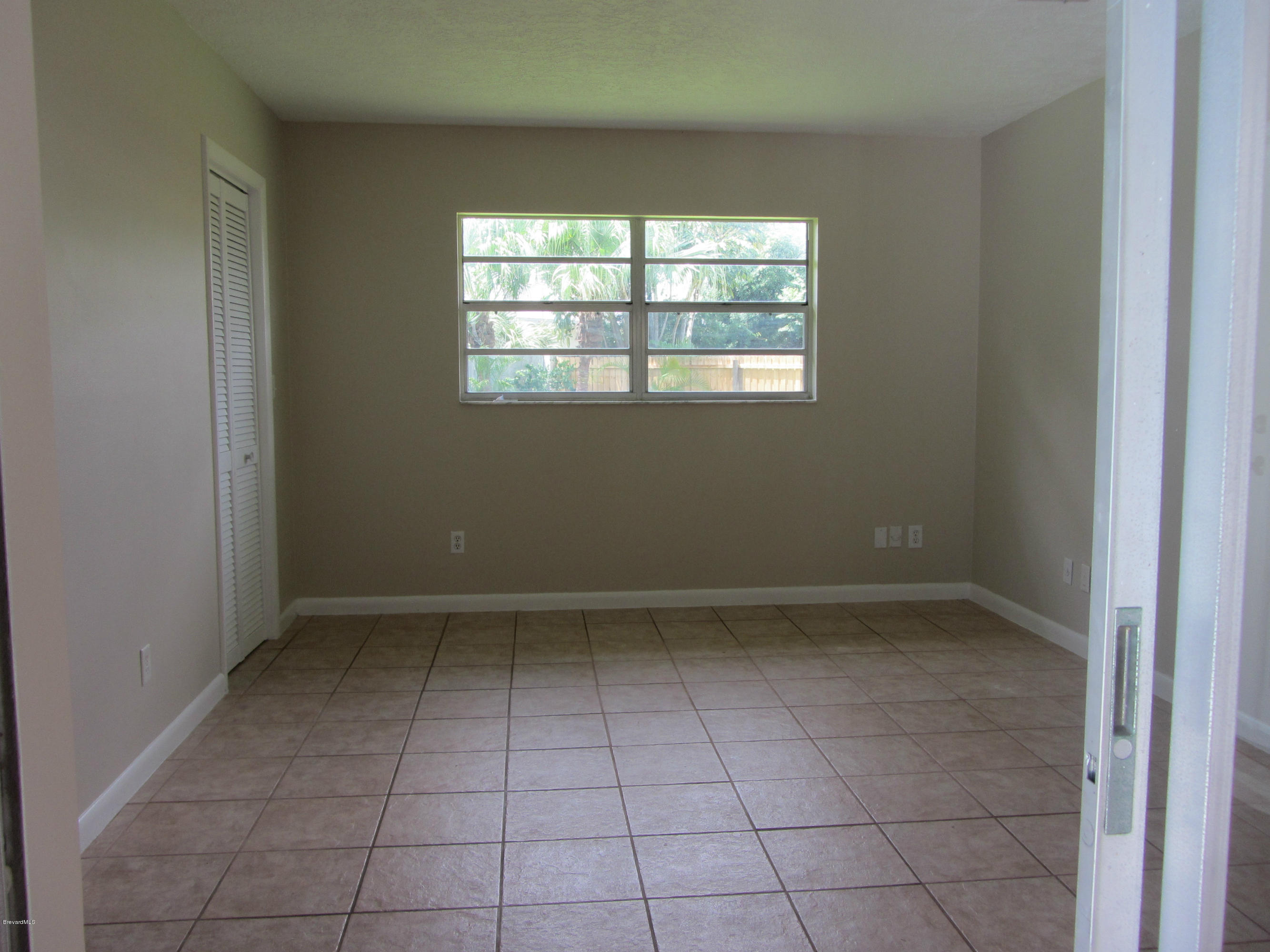 695 Caribbean Road Satellite Beach, FL 32937 - Photo 13 of 19 Master Bedroom