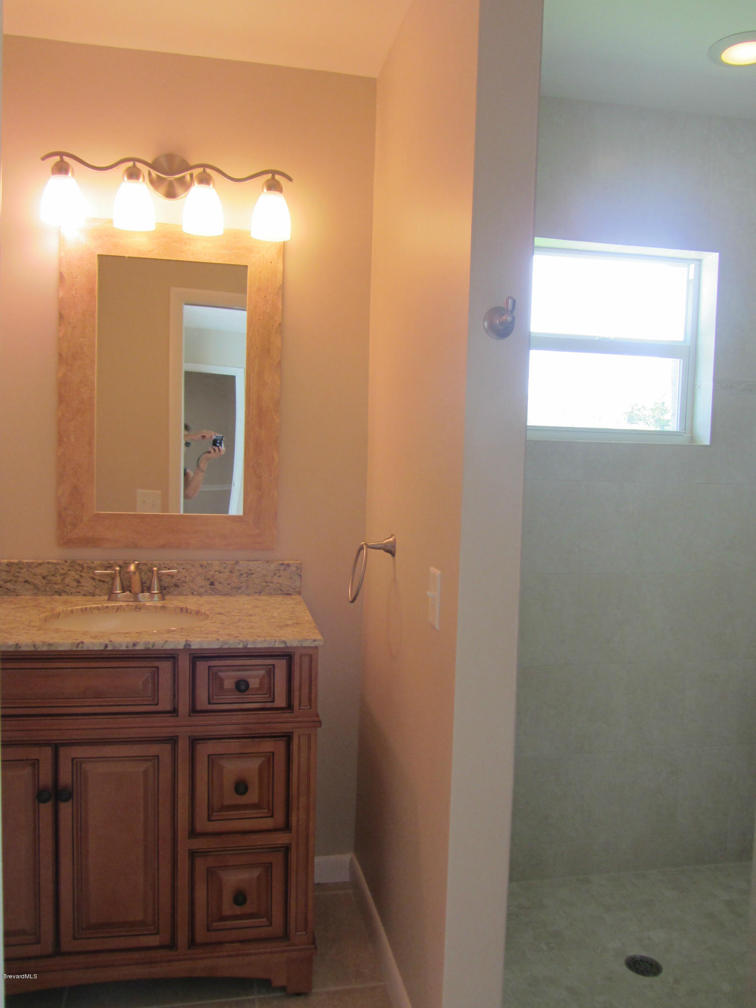 695 Caribbean Road Satellite Beach, FL 32937 - Photo 14 of 19 Master Bath