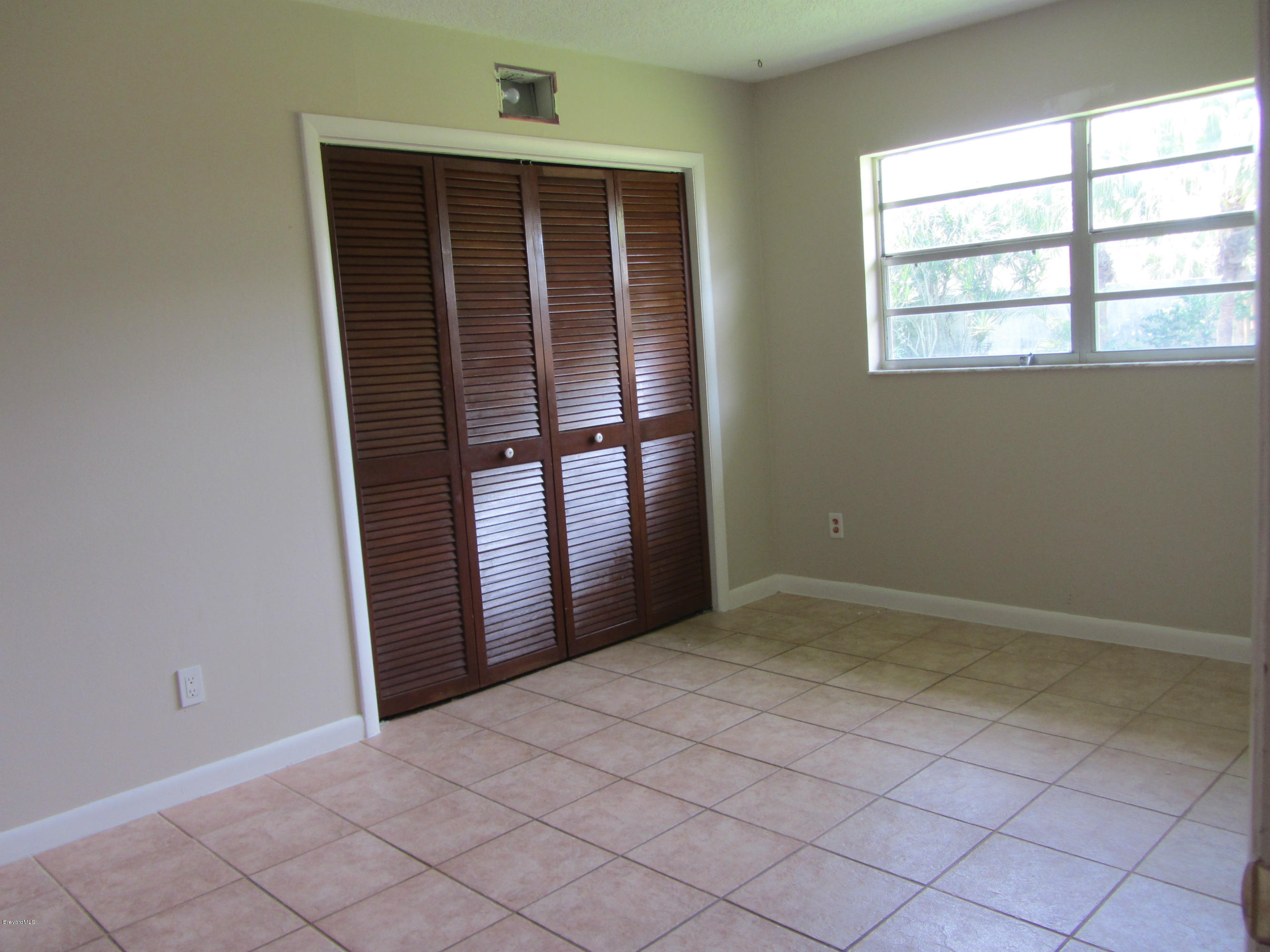 695 Caribbean Road Satellite Beach, FL 32937 - Photo 16 of 19 Bedroom 2