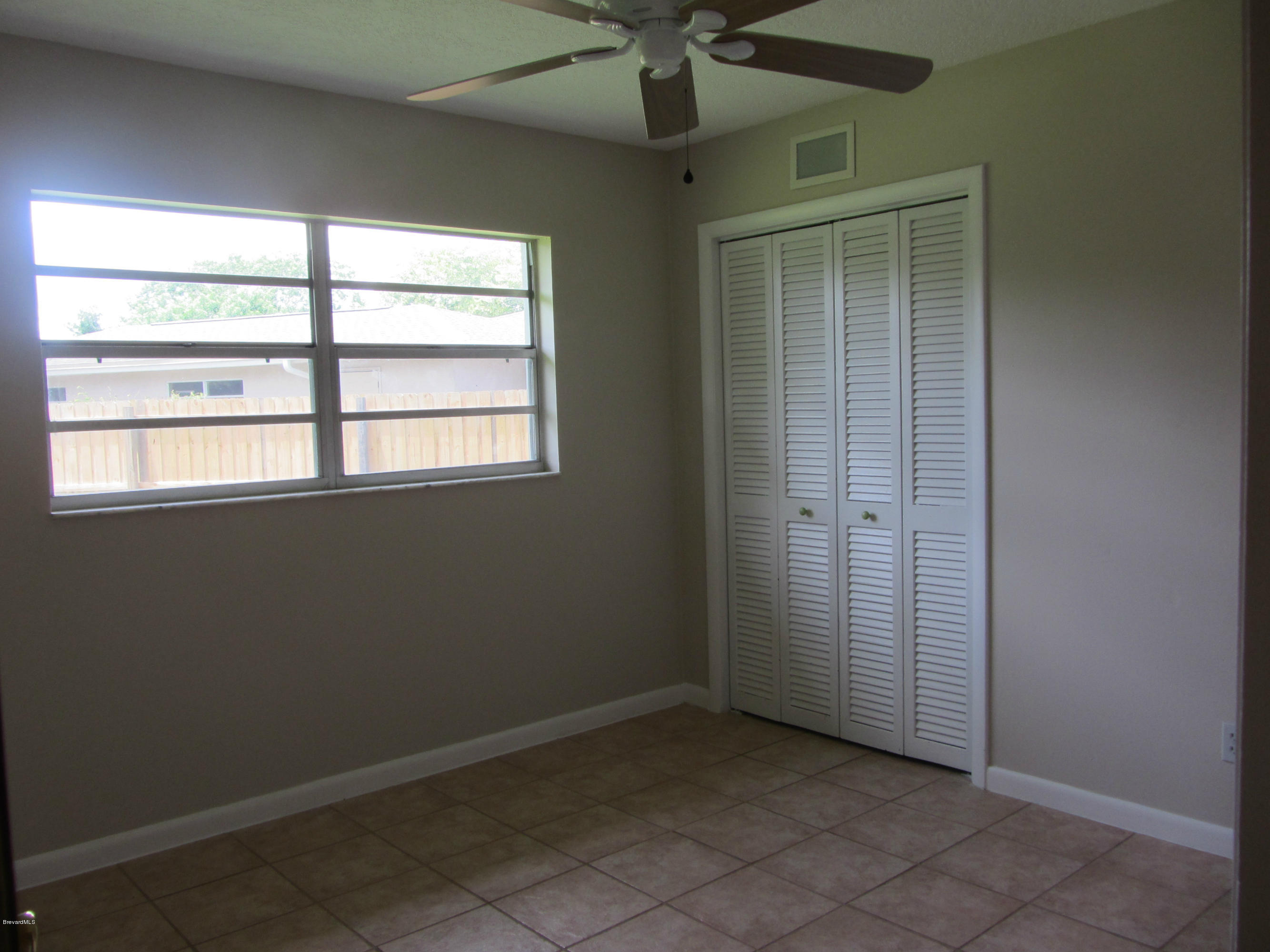 695 Caribbean Road Satellite Beach, FL 32937 - Photo 17 of 19 Bedroom 3