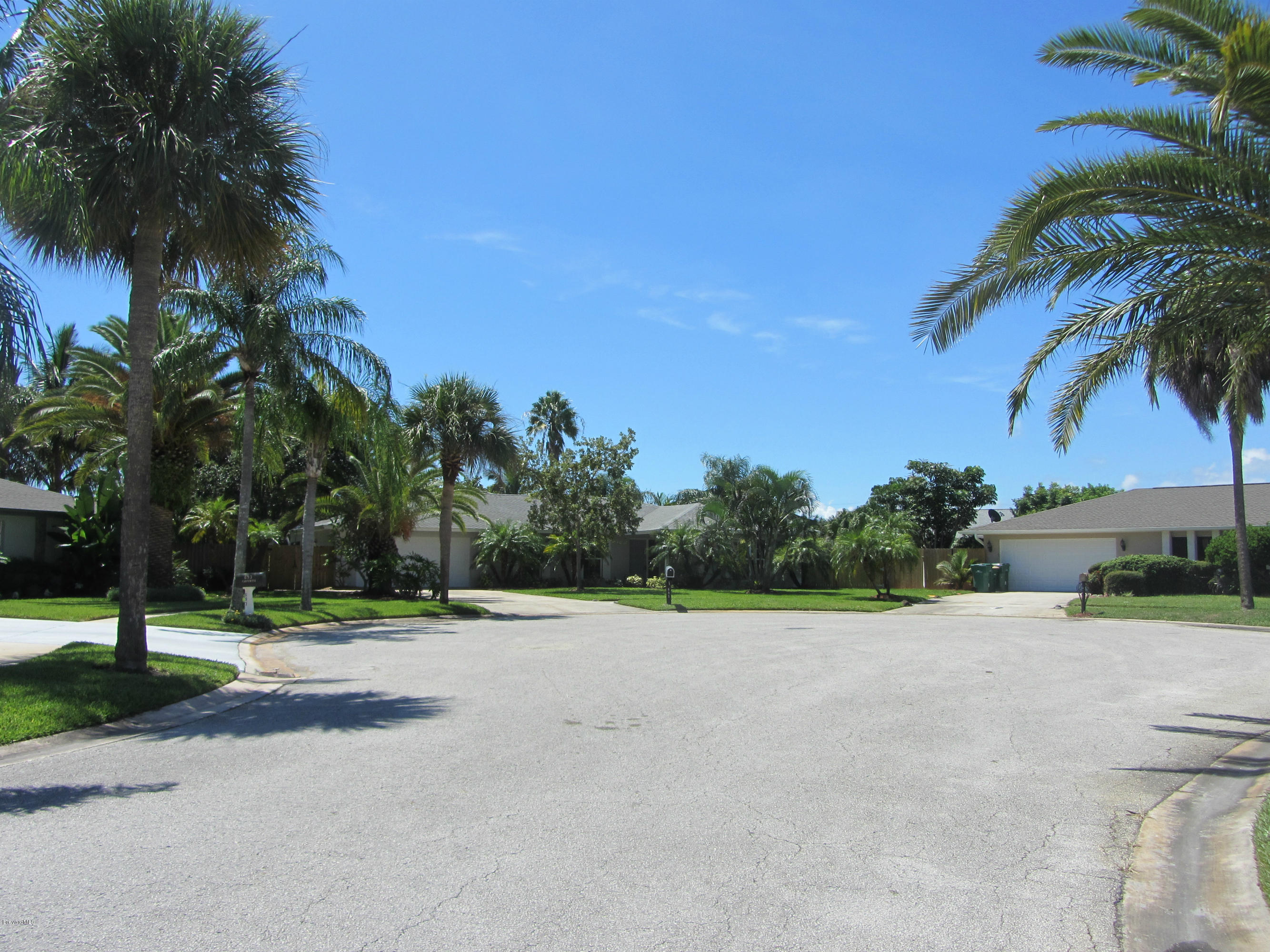 695 Caribbean Road Satellite Beach, FL 32937 - Photo 9 of 19 Property view entering cul de sac