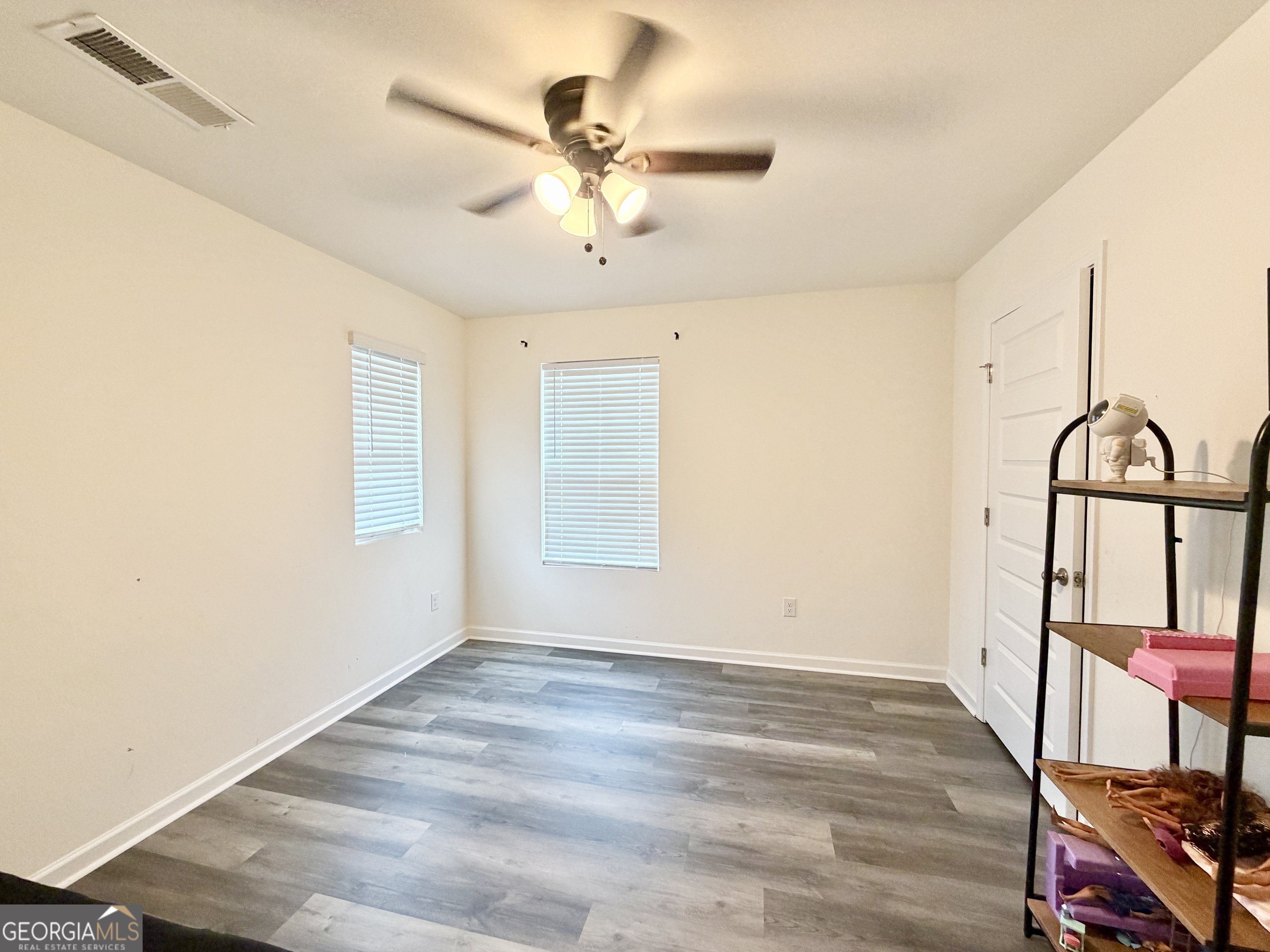 219 Barnyard Way Perry, GA 31069 - Photo 27 of 44 a view of an entryway with wooden floor