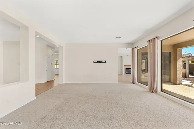 a view of swimming pool with a yard