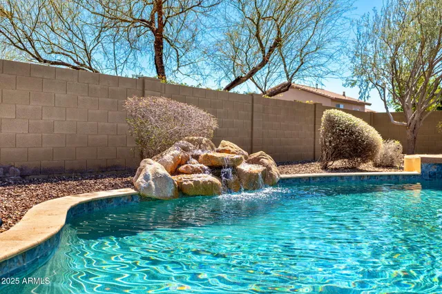 a view of a house with a swimming pool