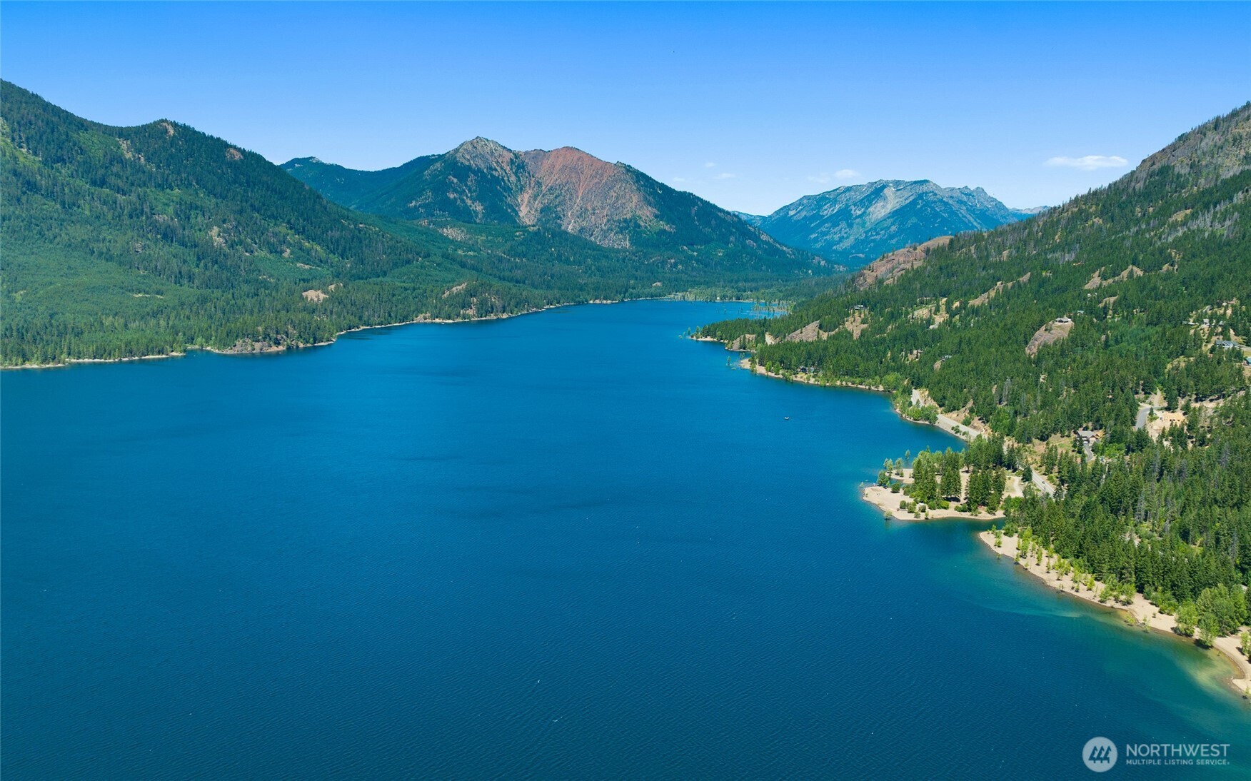 341 Tetons Lane Cle Elum, WA 98922 - Photo 12 of 20 a view of a lake with a mountain in the background