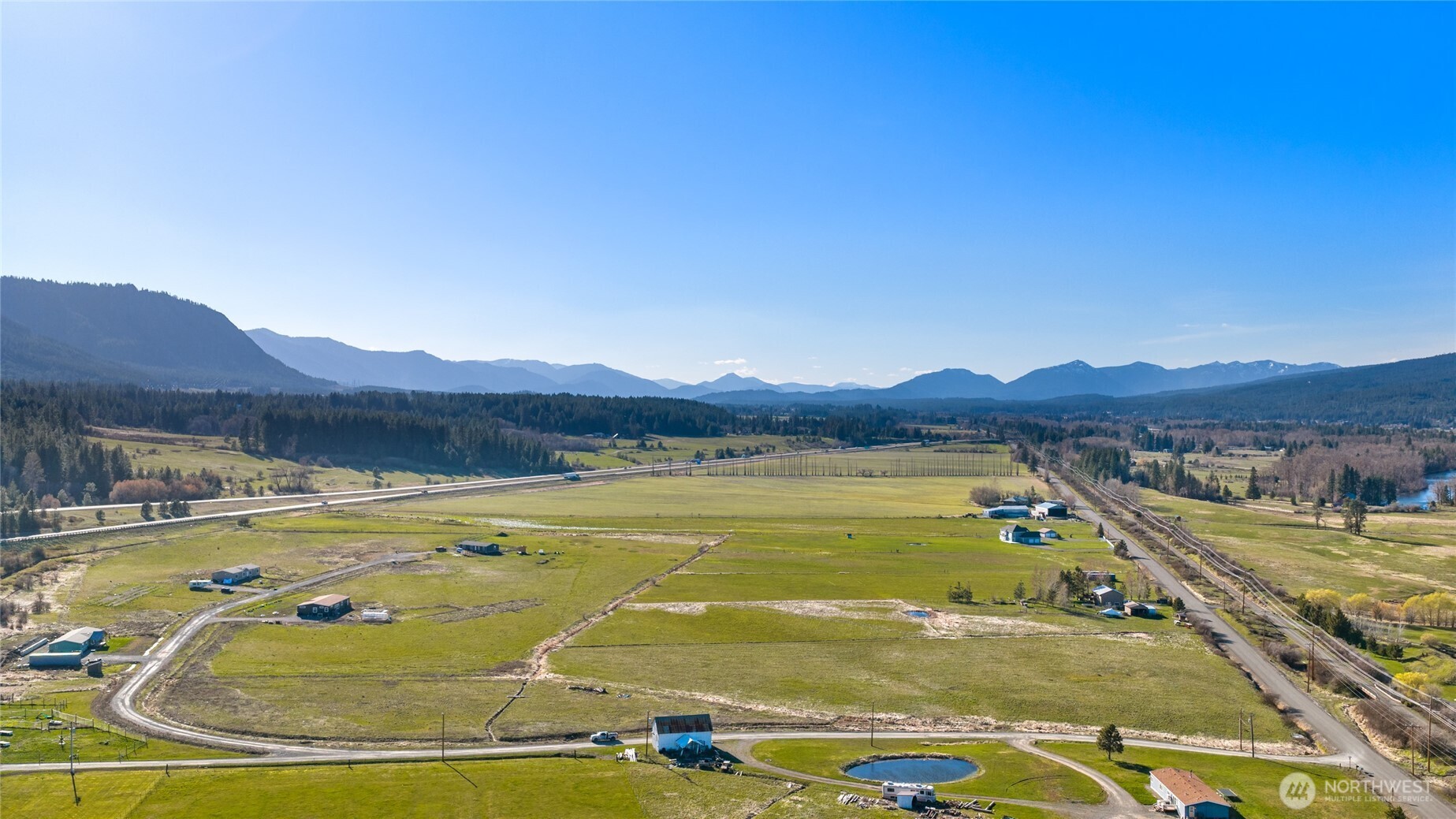 341 Tetons Lane Cle Elum, WA 98922 - Photo 2 of 20 a view of a lake with a mountain