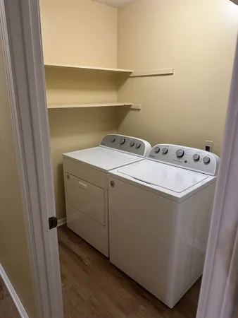 a utility room with dryer and washer