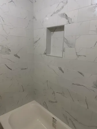 a bathroom with a bathtub