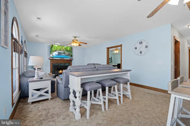 a dining room with furniture and window