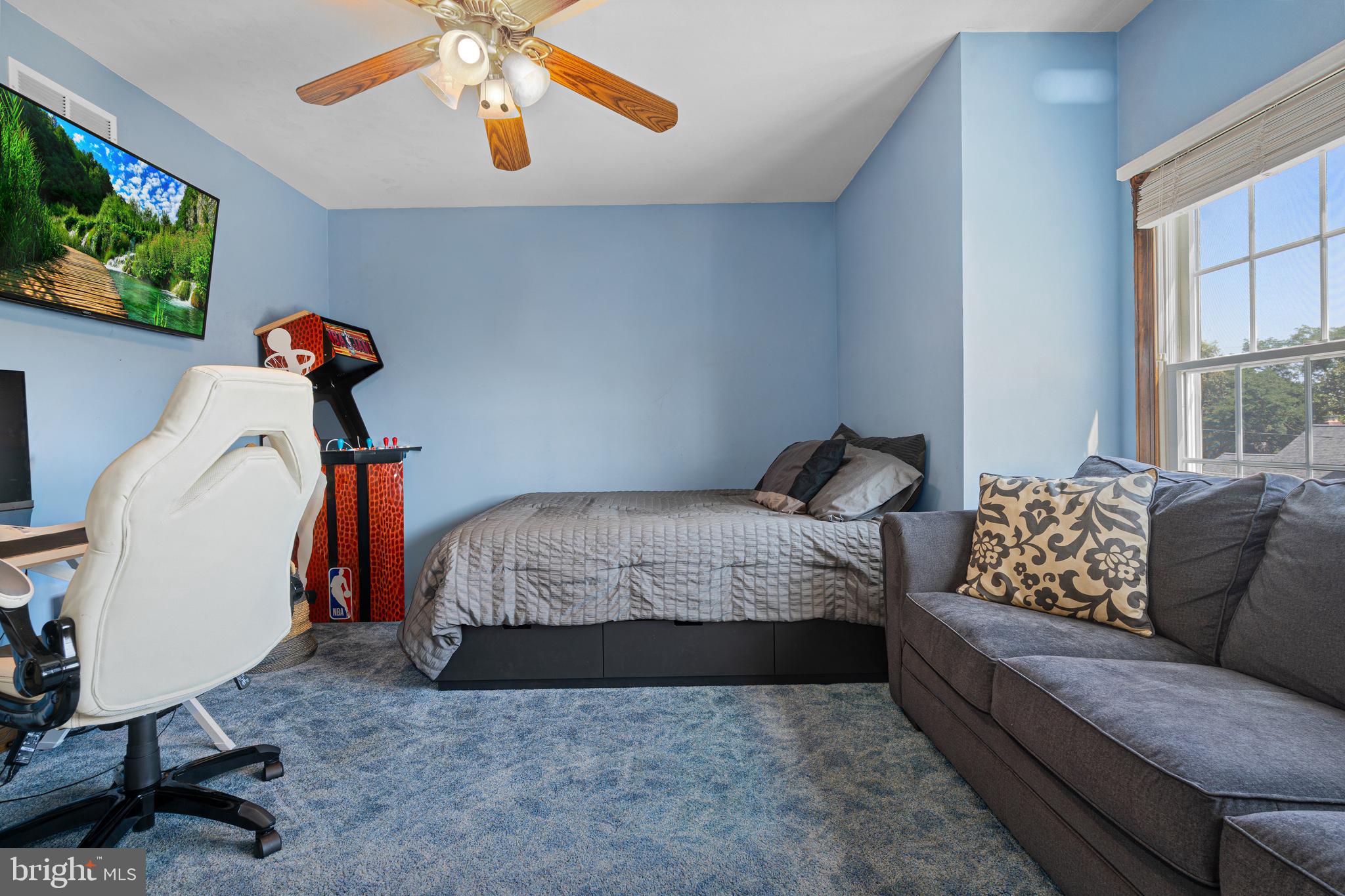 7808 Deboy Avenue Baltimore, MD 21222 - Photo 26 of 36 a bedroom with bed and a window